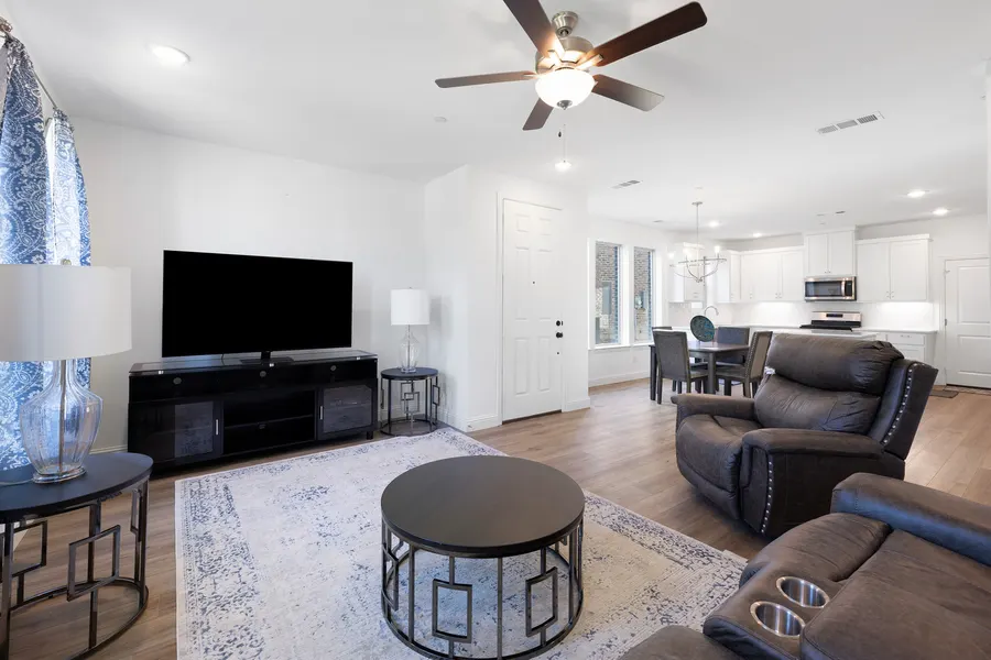 Office with a desk and three windows at 4335 Fall Blossom Dr