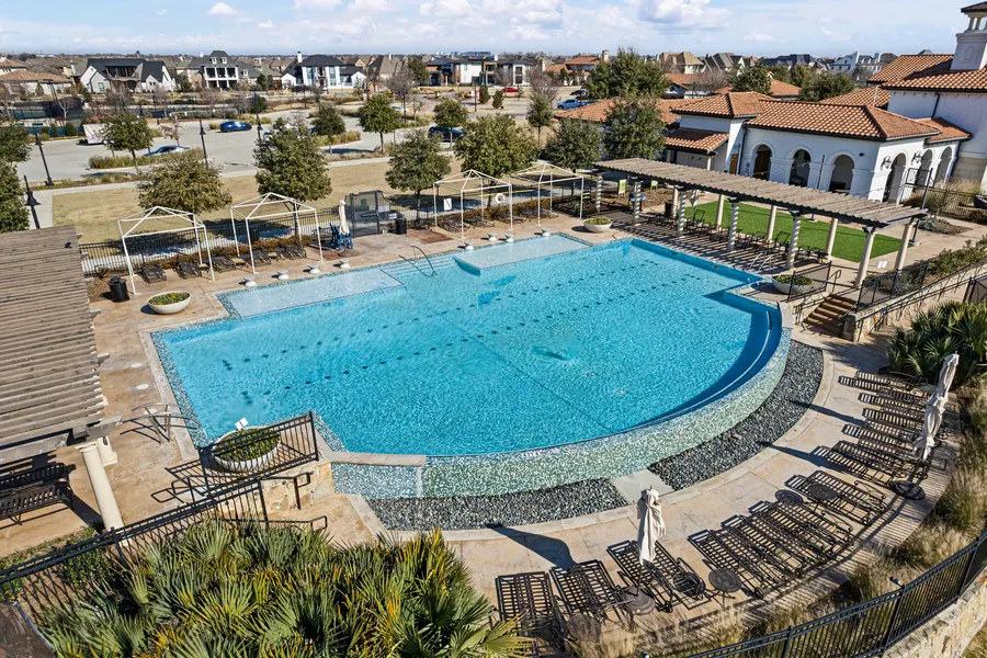 Viridian clubhouse pool with cabanas and loungers