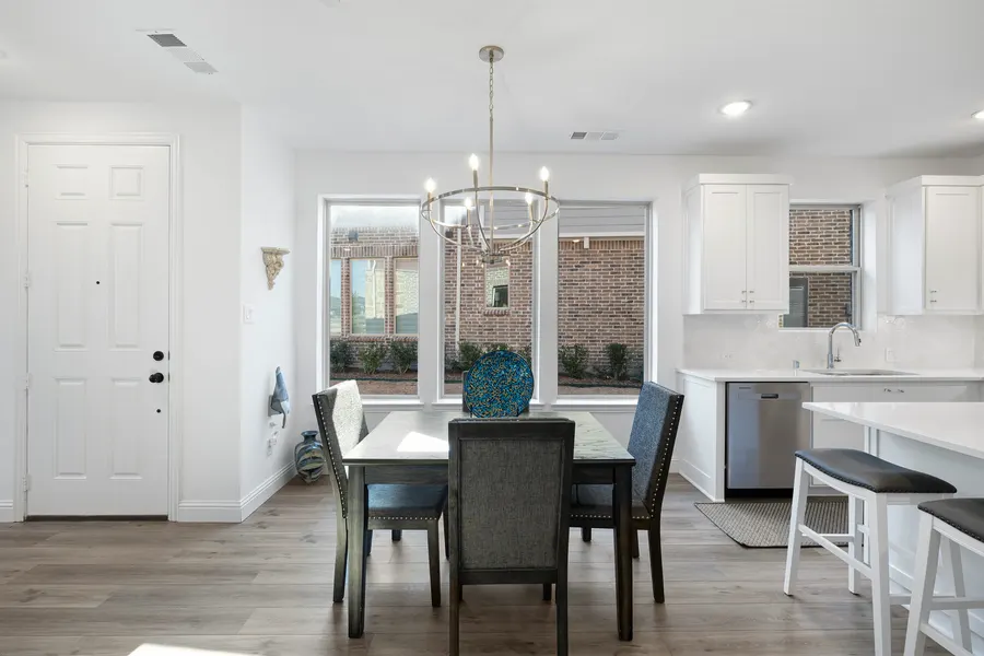Dining area open to the kitchen at 4335 Fall Blossom Dr