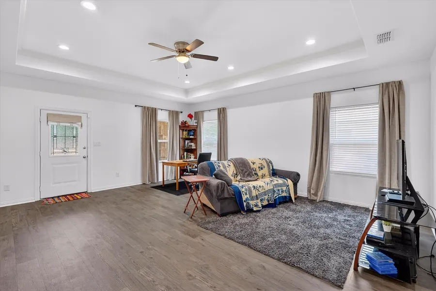 Living room near the front entry with wood look flooring at 4552 Corregidor St