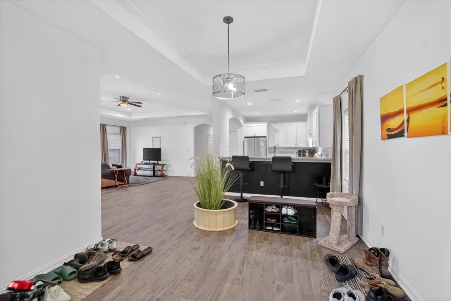 Kitchen island with bar seating open to the living room at 4552 Corregidor St