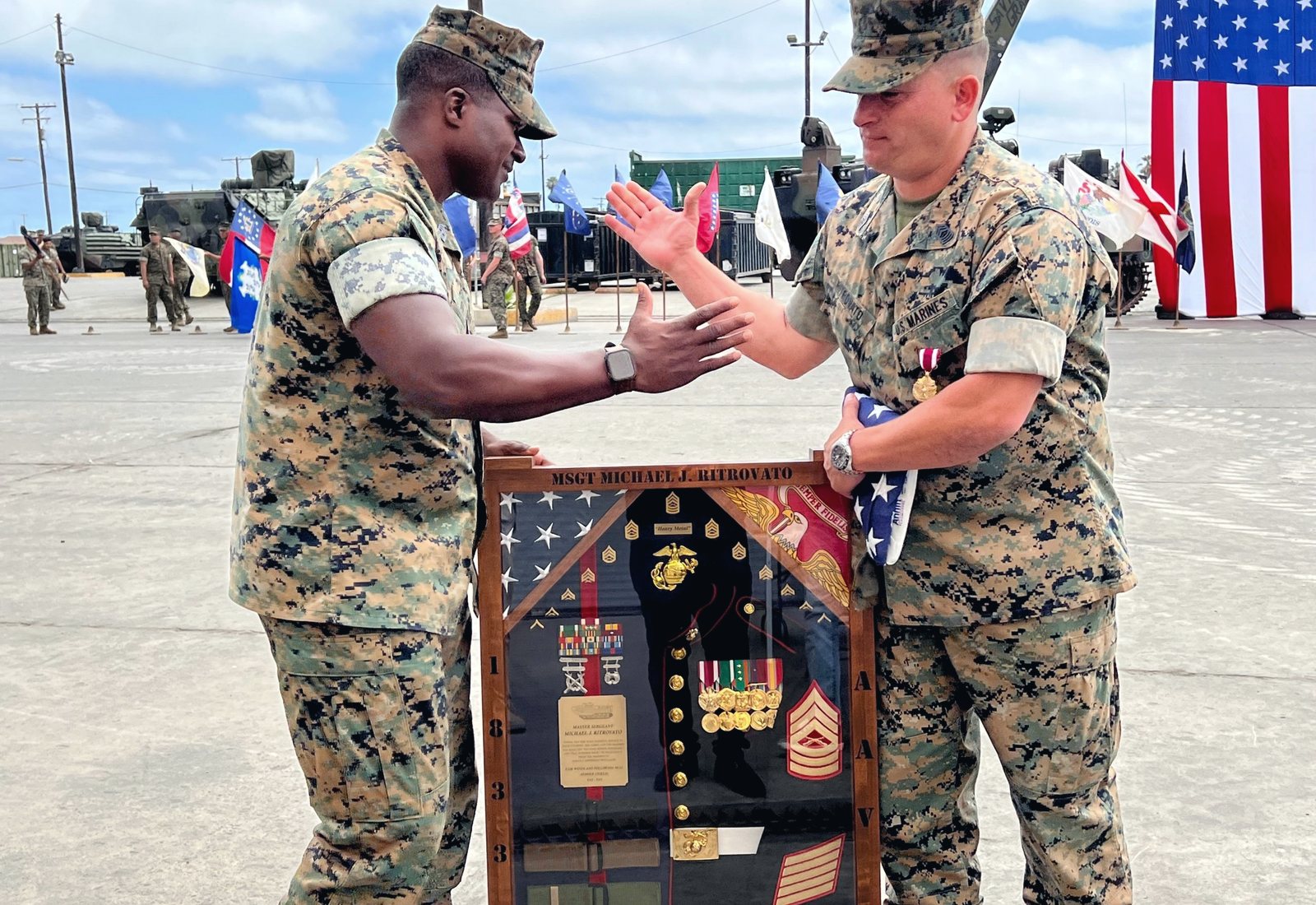 Mike Ritrovato being presented his shadow box at his United States Marine Corps retirement ceremony